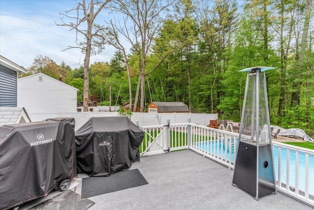 8 Bowman Ct, Merrimack, NH 03054 - fenced backyard featuring grilling area and a patio