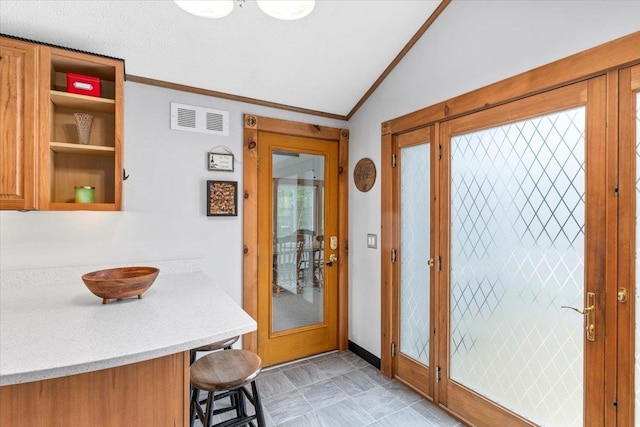 8 Bowman Ct, Merrimack, NH 03054 - foyer with lofted ceiling, baseboards, and ornamental molding