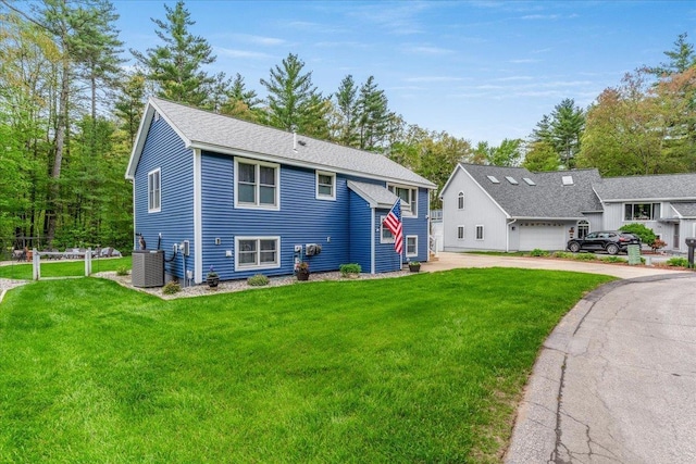 8 Bowman Ct, Merrimack, NH 03054 - view of front of house featuring cooling unit and driveway