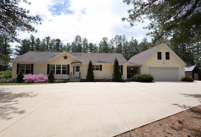 334 Silver Pine Ln, Tamworth, NH 03886 - view of front of house featuring concrete driveway