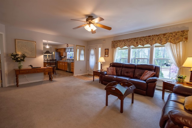 334 Silver Pine Ln, Tamworth, NH 03886 - living room featuring ceiling fan, light carpet, and baseboards