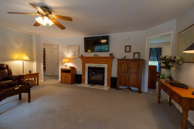 334 Silver Pine Ln, Tamworth, NH 03886 - carpeted living area with ceiling fan, a premium fireplace, and baseboards