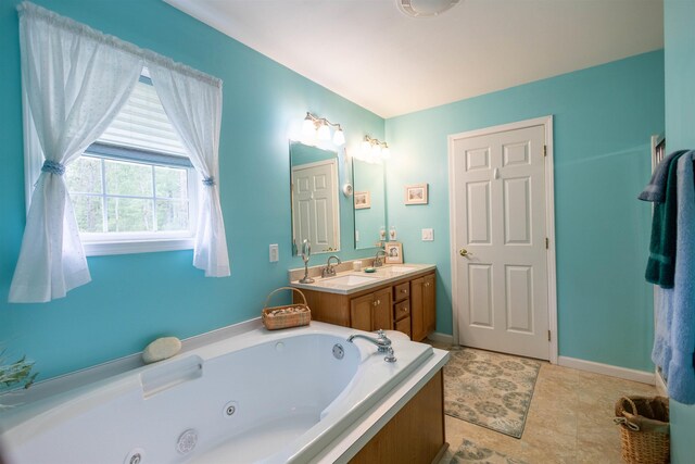 334 Silver Pine Ln, Tamworth, NH 03886 - full bath featuring a jetted tub, double vanity, and baseboards