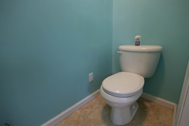 334 Silver Pine Ln, Tamworth, NH 03886 - bathroom with baseboards and toilet