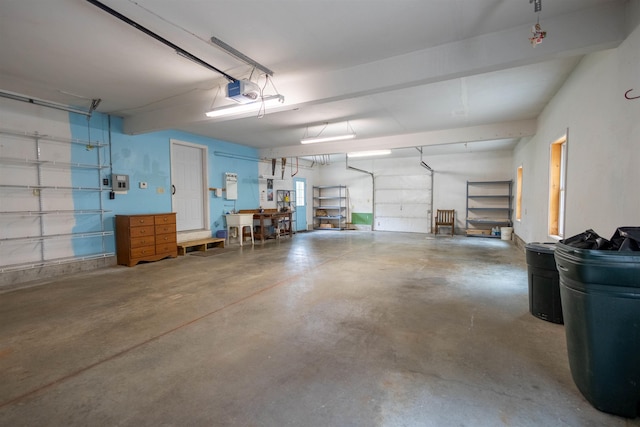 334 Silver Pine Ln, Tamworth, NH 03886 - garage featuring a garage door opener