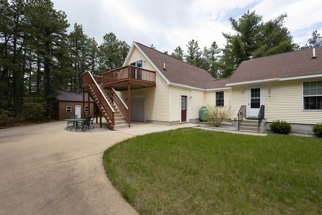 334 Silver Pine Ln, Tamworth, NH 03886 - view of front of home featuring a front lawn, a deck, stairs, and a shingled roof