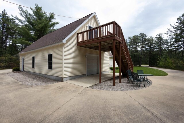 334 Silver Pine Ln, Tamworth, NH 03886 - view of side of property featuring a wooden deck, stairway, and a shingled roof