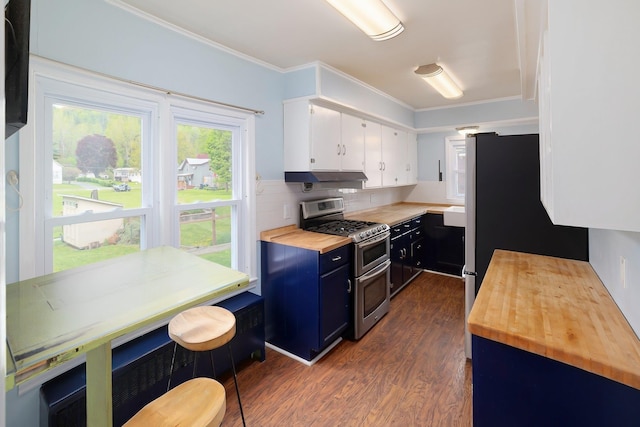14 Butler St, Waterbury, VT 05676 - kitchen featuring double oven range, wood counters, dark wood finished floors, white cabinets, and under cabinet range hood