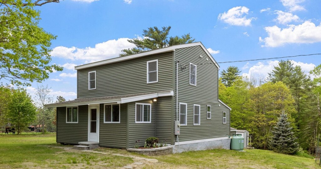 374 S Barnstead Rd, Barnstead, NH 03225 - back of house featuring a lawn