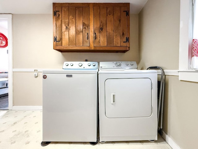 33 Tanner St, Concord, NH 03303 - laundry area featuring independent washer and dryer and cabinet space