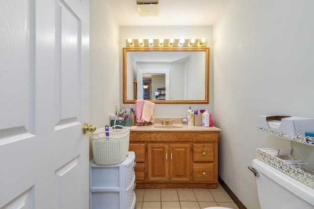 33 Tanner St, Concord, NH 03303 - bathroom featuring vanity and tile patterned flooring