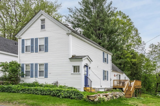 33 Tanner St, Concord, NH 03303 - view of front of house featuring entry steps, a wooden deck, stairway, and a shingled roof