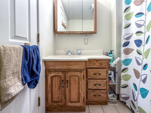 33 Tanner St, Concord, NH 03303 - bathroom with vanity, tile patterned floors, and a shower with curtain