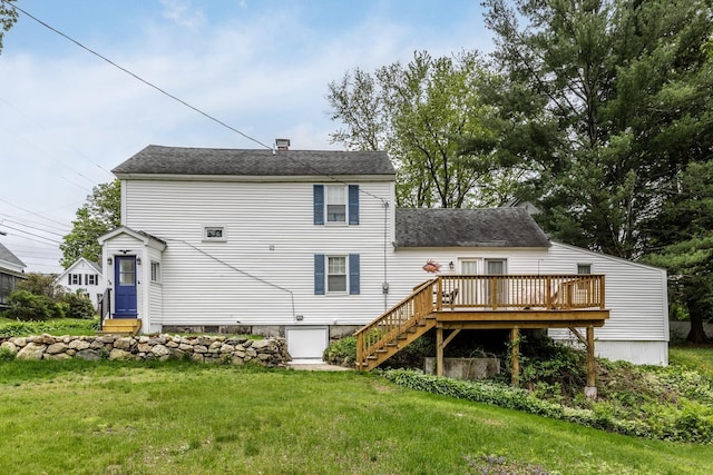 33 Tanner St, Concord, NH 03303 - rear view of property featuring a lawn, a deck, stairway, and a shingled roof