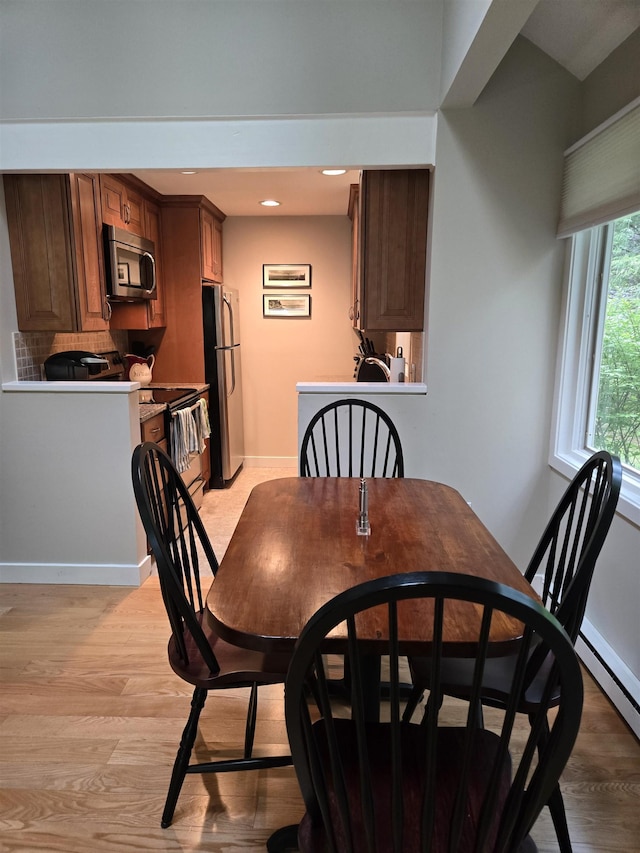46 Point Breeze Rd, Wolfeboro, NH 03894 - dining room featuring light wood-type flooring, recessed lighting, and baseboards