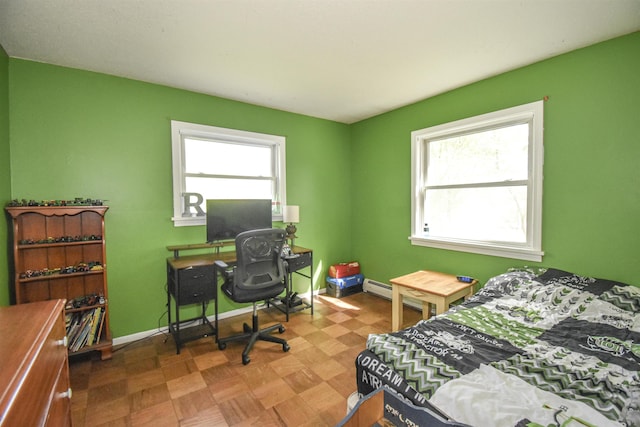 bedroom featuring a baseboard radiator and baseboards