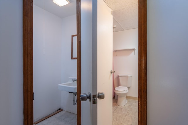 143 Okemo Acres, Ludlow, VT 05149 - bathroom featuring toilet, a drop ceiling, and a sink