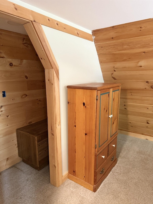 9 Spruce Rd, Middleton, NH 03887 - bonus room with light colored carpet, wood walls, and vaulted ceiling