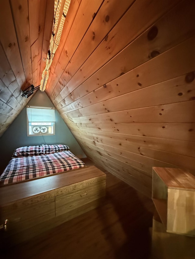 9 Spruce Rd, Middleton, NH 03887 - additional living space featuring wood finished floors and vaulted ceiling