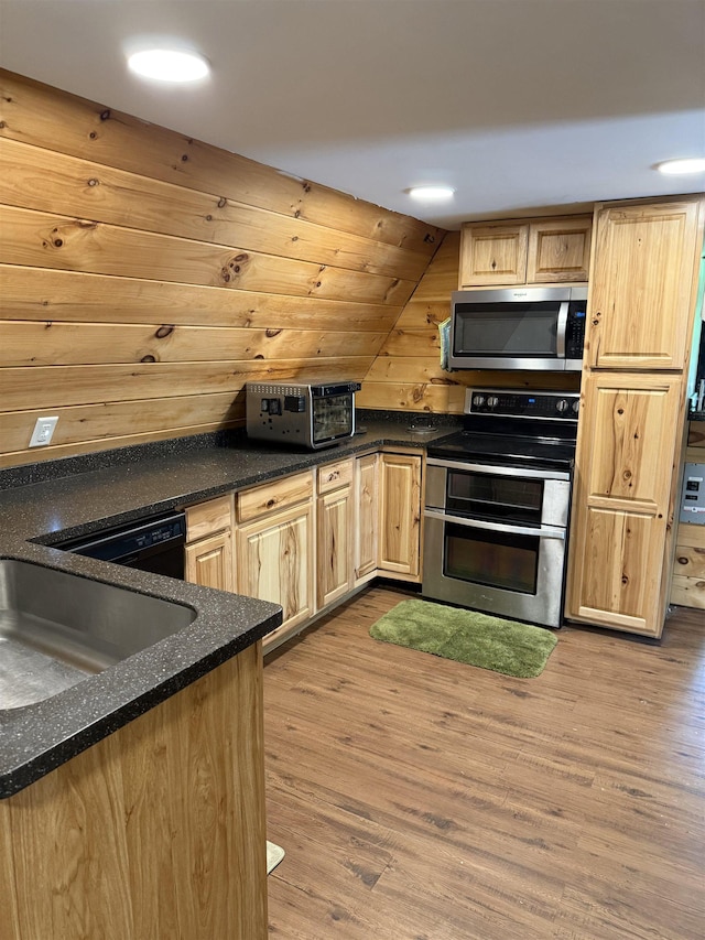 9 Spruce Rd, Middleton, NH 03887 - kitchen with appliances with stainless steel finishes, light brown cabinets, wood finished floors, and a sink