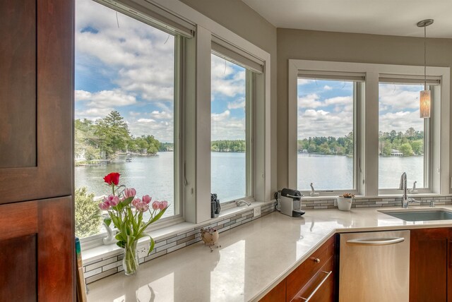 25 N Shore Rd, Windham, NH 03087 - kitchen featuring a sink, a water view, and plenty of natural light