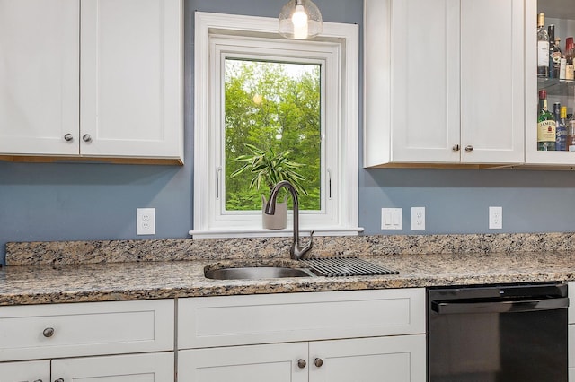 105 Fall Mill Rd, York, ME 03909 - kitchen with black dishwasher, white cabinets, a sink, and light stone countertops