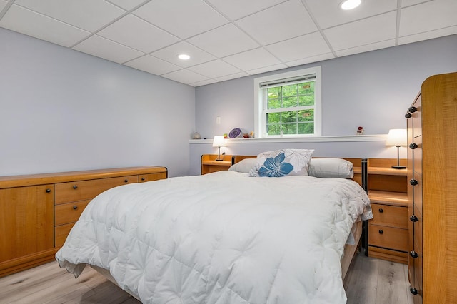 105 Fall Mill Rd, York, ME 03909 - bedroom with light wood-style flooring, a paneled ceiling, and recessed lighting