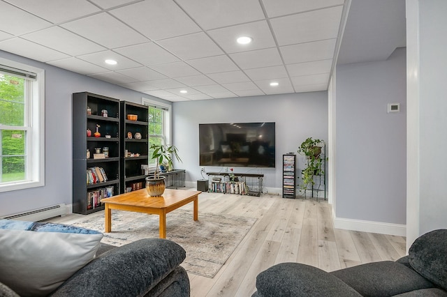 105 Fall Mill Rd, York, ME 03909 - living area featuring a baseboard radiator, wood finished floors, baseboards, and recessed lighting