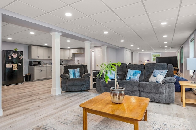 105 Fall Mill Rd, York, ME 03909 - living room with light wood-type flooring, ornate columns, and recessed lighting