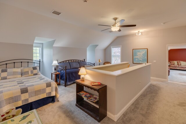104 Champagne Cir, Campton, NH 03223 - bedroom featuring light carpet, vaulted ceiling, baseboards, and a ceiling fan