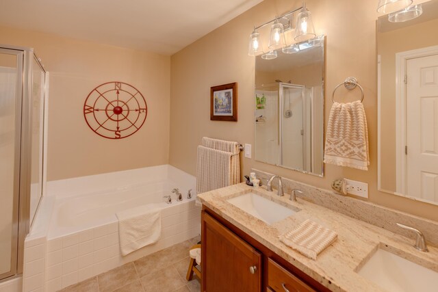 104 Champagne Cir, Campton, NH 03223 - bathroom featuring a shower stall, a garden tub, double vanity, and tile patterned floors