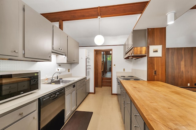 25 Wendover Way, Bedford, NH 03110 - kitchen with a sink, dishwasher, butcher block counters, gray cabinets, and decorative backsplash