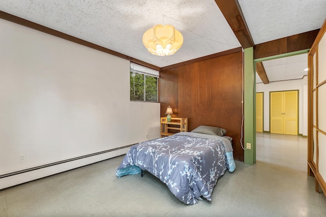 25 Wendover Way, Bedford, NH 03110 - bedroom with a baseboard heating unit and wooden walls