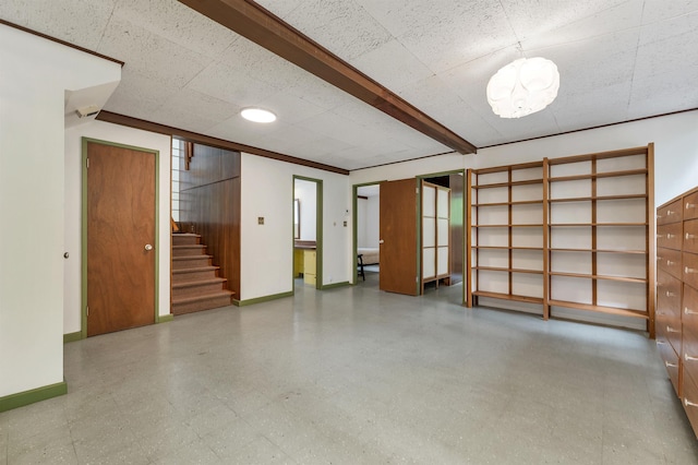 25 Wendover Way, Bedford, NH 03110 - finished below grade area with stairway, baseboards, and tile patterned floors