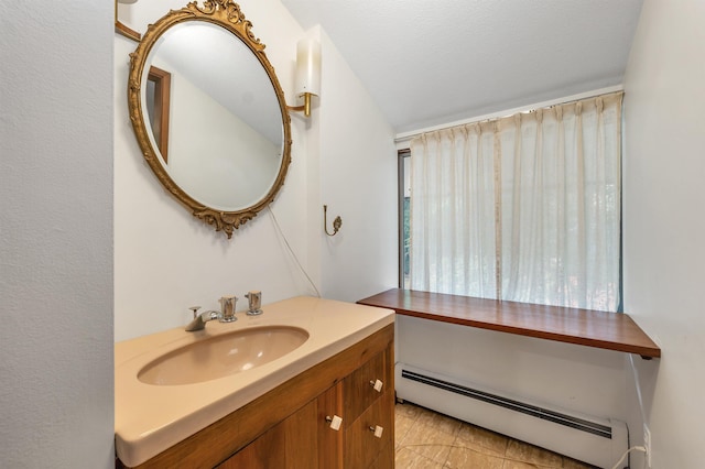 25 Wendover Way, Bedford, NH 03110 - bathroom featuring a baseboard radiator and vanity