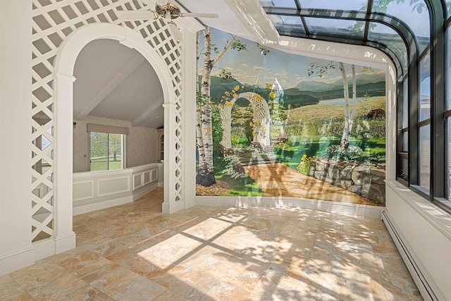 43 Sterling Pl, Bow, NH 03304 - entryway featuring baseboard heating, stone tile flooring, a sunroom, and arched walkways