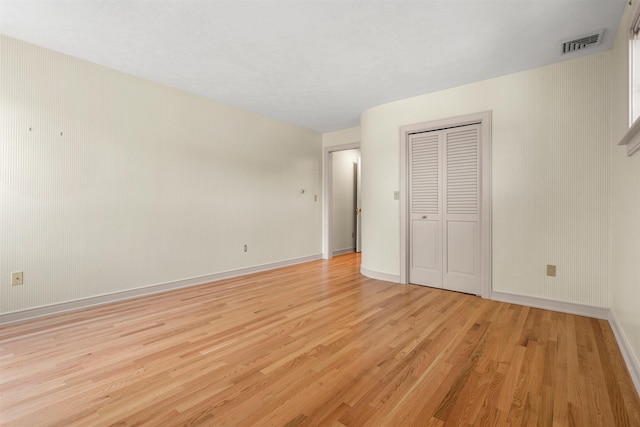 43 Sterling Pl, Bow, NH 03304 - unfurnished bedroom featuring light wood-style floors, baseboards, and a closet