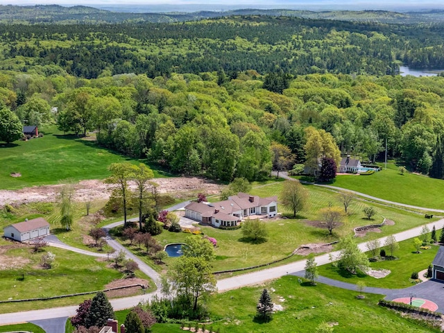 43 Sterling Pl, Bow, NH 03304 - aerial view of a heavily wooded area and a nearby body of water