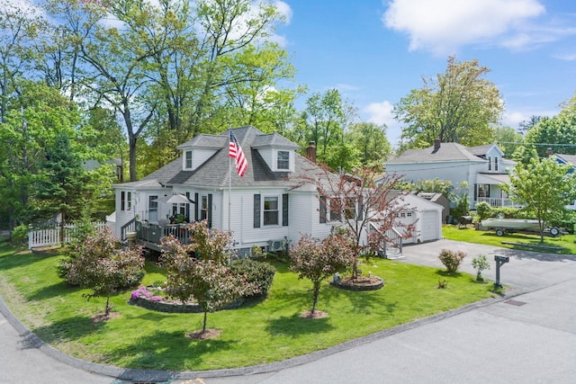 29 Warren Ave, Goffstown, NH 03045 - new england style home with a garage, a front lawn, asphalt driveway, a wooden deck, and a chimney