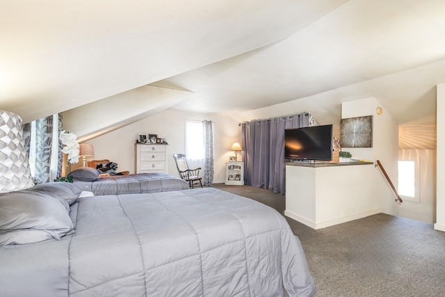 141 Hemmsted Cir # 6, Castleton, VT 05732 - bedroom with lofted ceiling, carpet floors, and baseboards