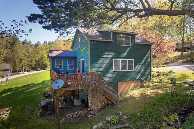 141 Hemmsted Cir # 6, Castleton, VT 05732 - back of house with a lawn, a wooden deck, and stairs