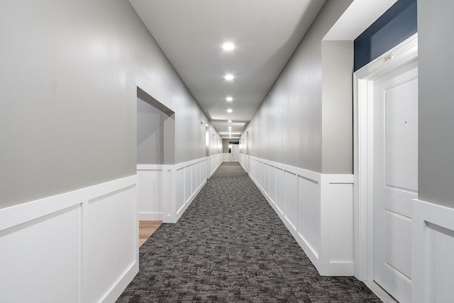 10100 S Willow St Unit 113, Manchester, NH 03103 - corridor with carpet floors, wainscoting, recessed lighting, and a decorative wall