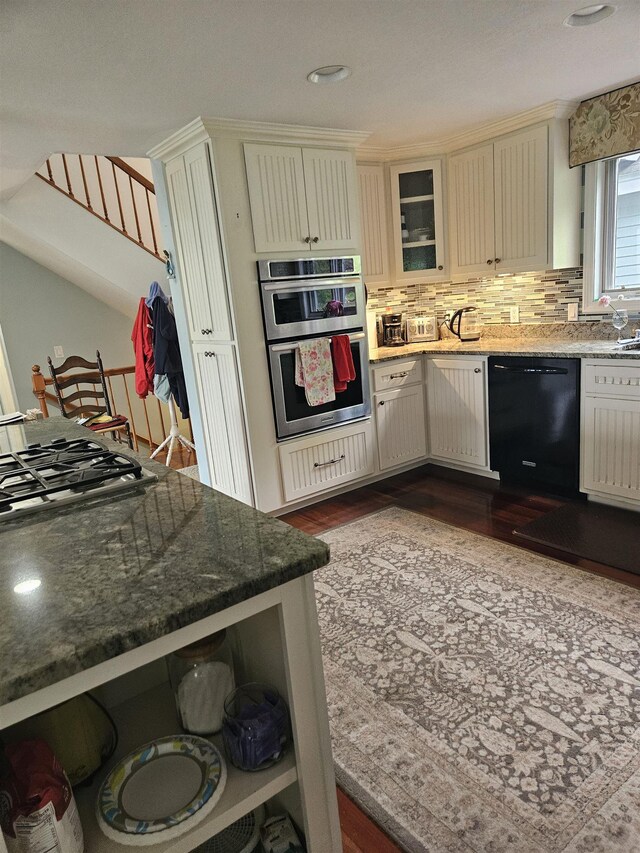 45 Deacon Willey Rd, Campton, NH 03223 - kitchen featuring appliances with stainless steel finishes, dark wood finished floors, backsplash, cream cabinets, and glass insert cabinets