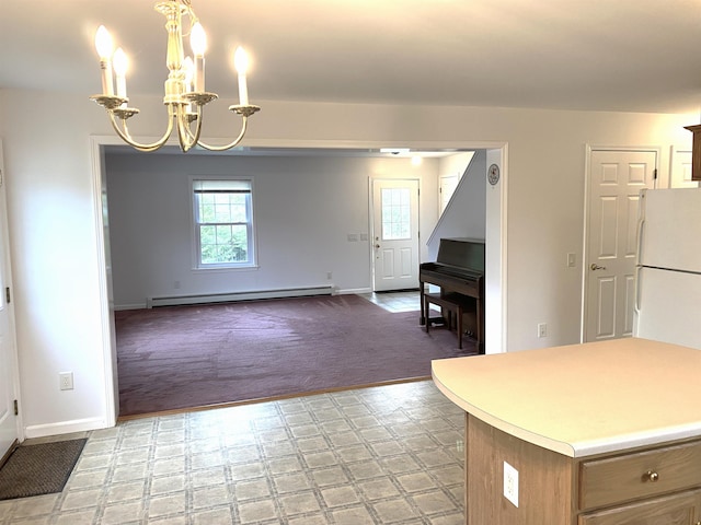 32 Henry Taylor St, Salem, NH 03079 - kitchen with baseboard heating, freestanding refrigerator, a chandelier, light carpet, and baseboards