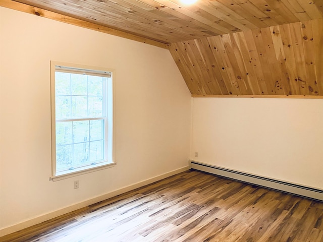 32 Henry Taylor St, Salem, NH 03079 - additional living space with vaulted ceiling, wood ceiling, wood finished floors, a baseboard heating unit, and baseboards