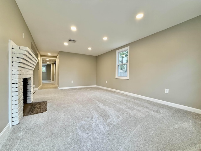 3 Lyndale Ave, Salem, NH 03079 - unfurnished living room featuring carpet floors, recessed lighting, baseboards, and a brick fireplace