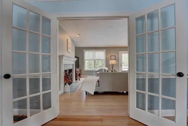 155 Middle Rd, Brentwood, NH 03833 - hall with wood finished floors and french doors