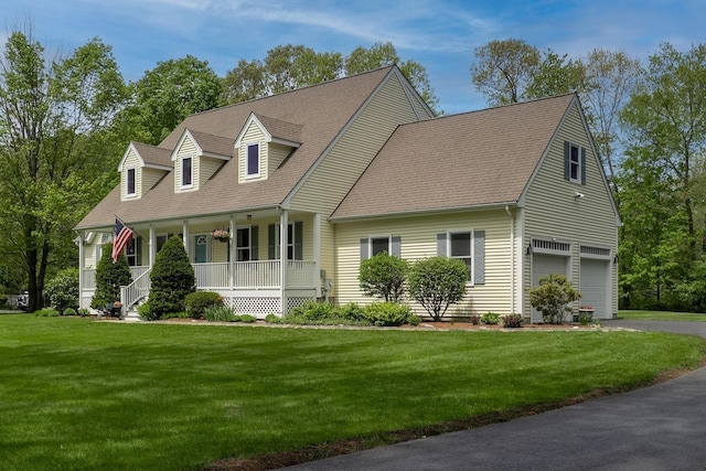 155 Middle Rd, Brentwood, NH 03833 - cape cod-style house with a porch, driveway, an attached garage, a front lawn, and roof with shingles