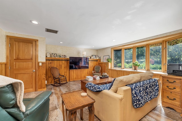 37 Port Wedeln Rd, Wolfeboro, NH 03894 - living area featuring a wainscoted wall, wood walls, light wood-style flooring, and recessed lighting
