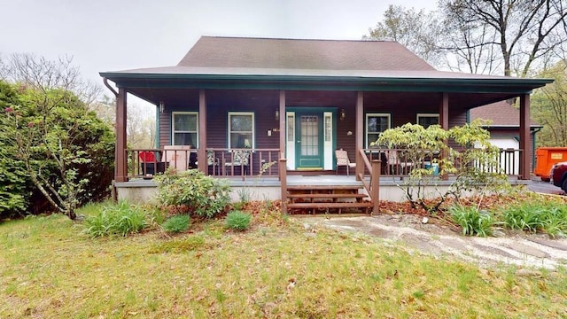 1862 Hooksett Rd, Hooksett, NH 03106 - view of front of property featuring a porch and a front yard